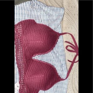 Swim suit top with tags.